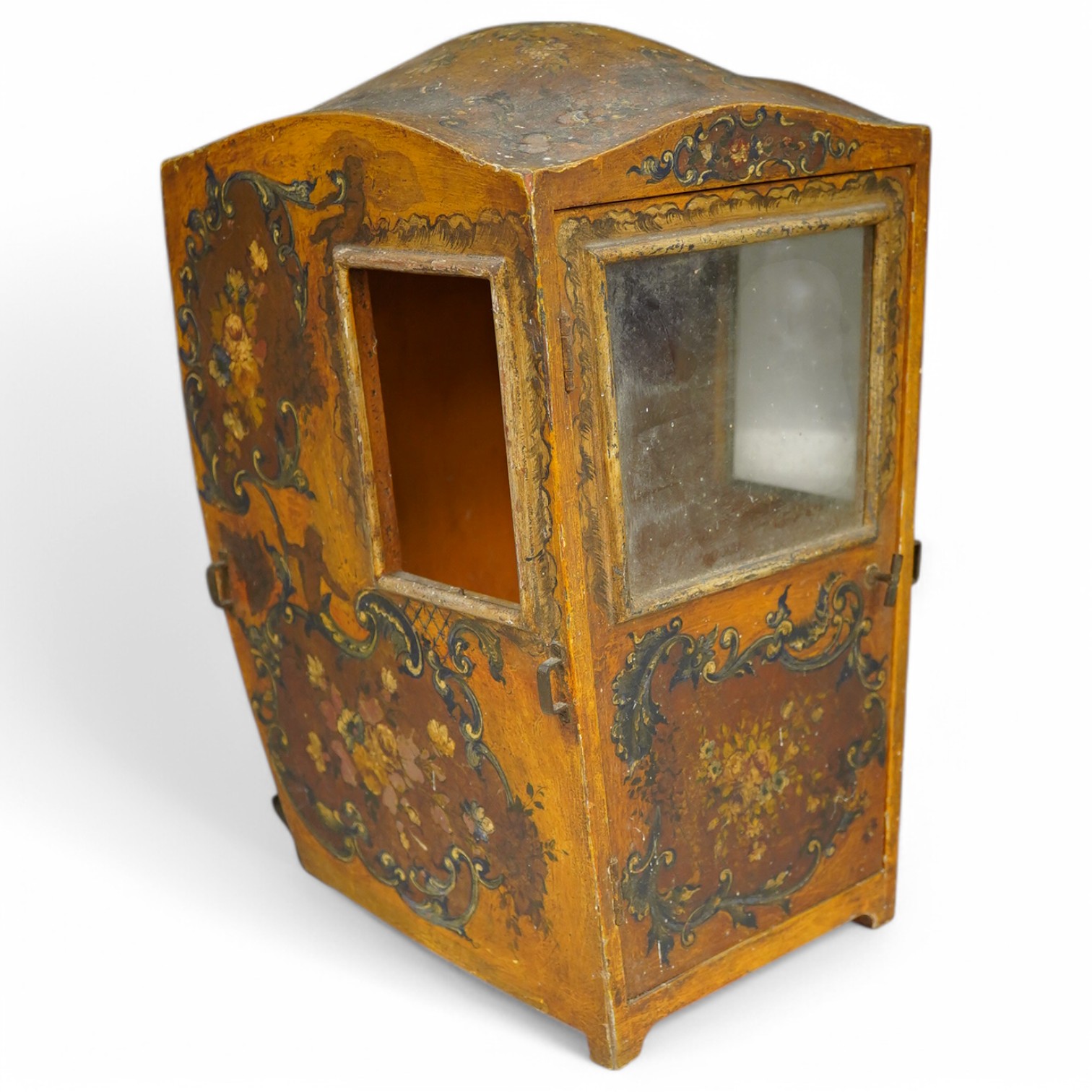 A Venetian painted wooden model of a sedan chair, probably designed for a doll, 36cm high. Condition - some crazing to the painted cartouche decoration, gilt worn, One glass panel missing